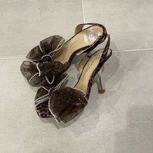 Betsey Johnson Fawn mesh bow heeled sandals leopard print with faux pearl trim.